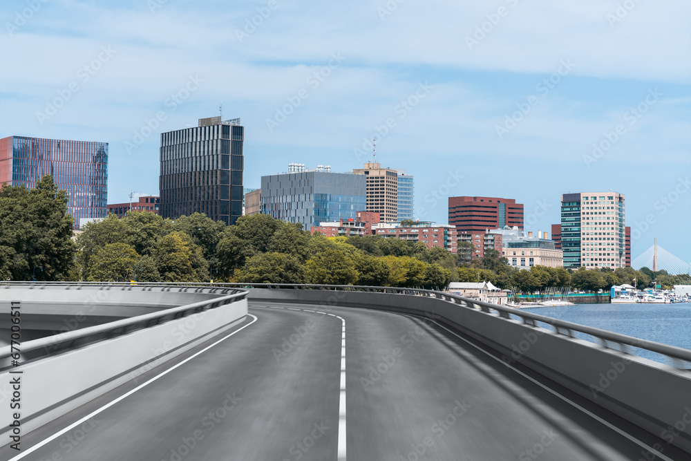 Empty urban asphalt road exterior with city buildings background. New modern highway concrete construction. Concept of way to success. Transportation logistic industry fast delivery. Boston. USA.