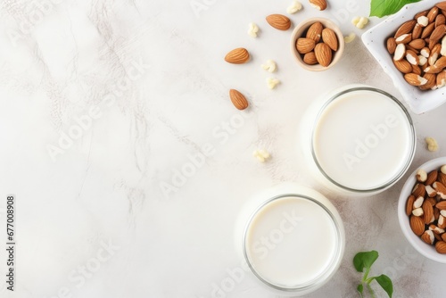 Top view of a variety of vegan dairy free milk options made from nuts and grains suitable for healthy eating