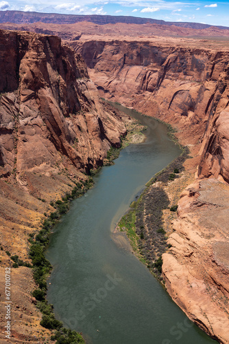 Scenic Vertical Shot of Horseshoe Bend canyon overlooking Colorado River in Page Arizona, USA.