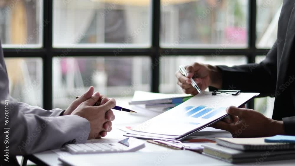 Business consultant meeting is discussing strategic analysis and planning of business investment projects. Statistical analysis growth financial chart. Business consultant meeting is discussing strategic analysis and planning of business investment projects. Statistical analysis growth financial chart.