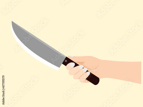 hand holding a knife on a yellow background.