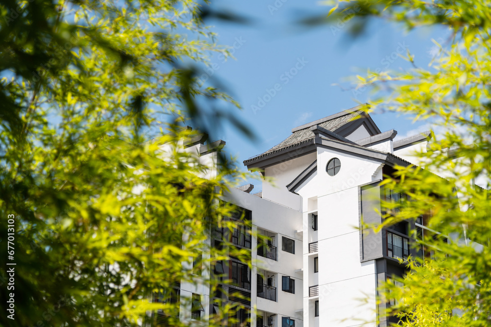 Obraz premium Modern apartment buildings with Chinese style rooftops