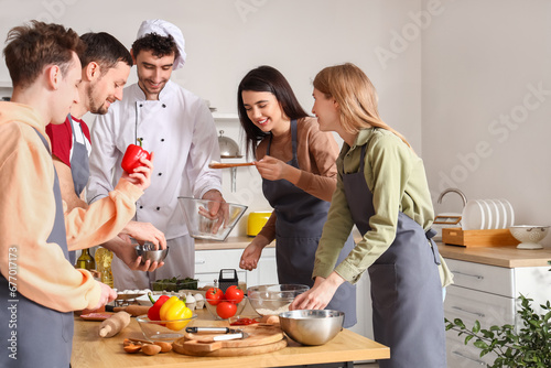 Italian chef with group of ...