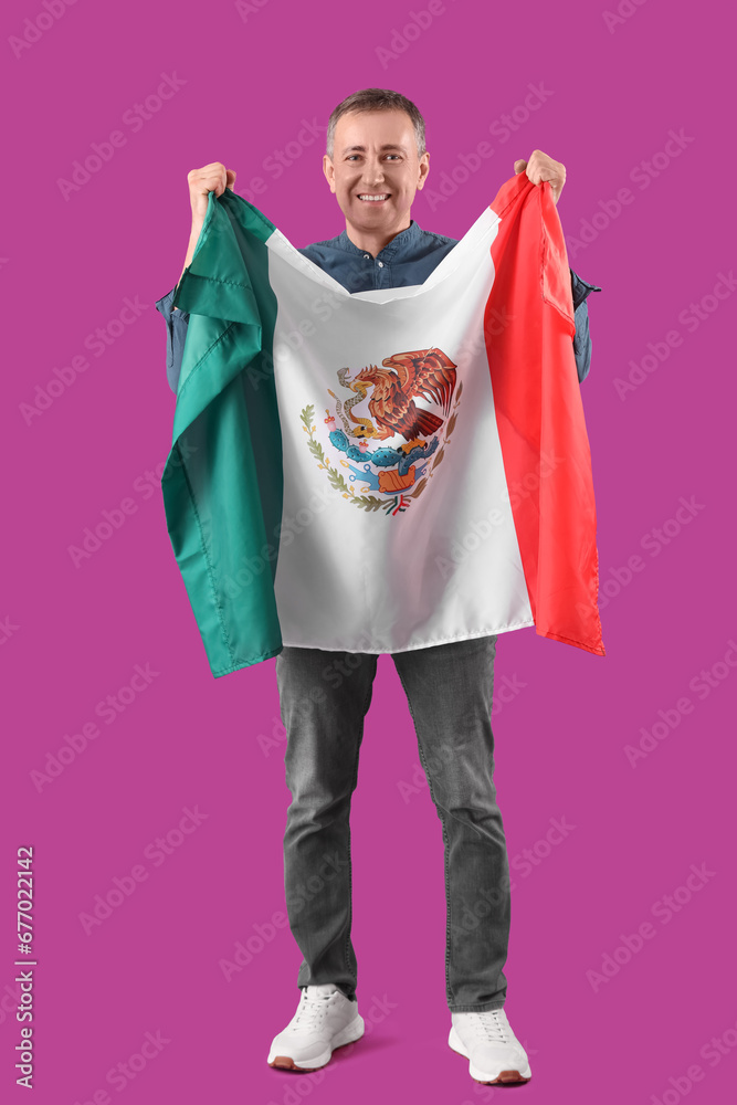 Mature man with Mexican flag on purple background