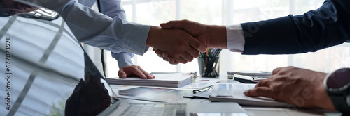 Businessman shaking hands with partner. Greeting. Business joint venture concept. For business finance, investment, teamwork and successful business.