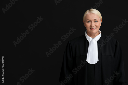 Mature female judge on blac...