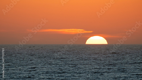 Fototapeta Naklejka Na Ścianę i Meble -  Sunset on the California central coast at Big Sur on the west coast of the United States
