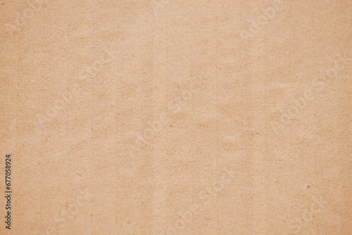 Brown corrugated cardboard texture background. Brown paper cardboard with soft color. Brown corrugated cardboard texture is useful as a background.