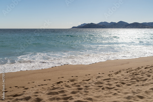 Sand beach of South France during spring with sea waves