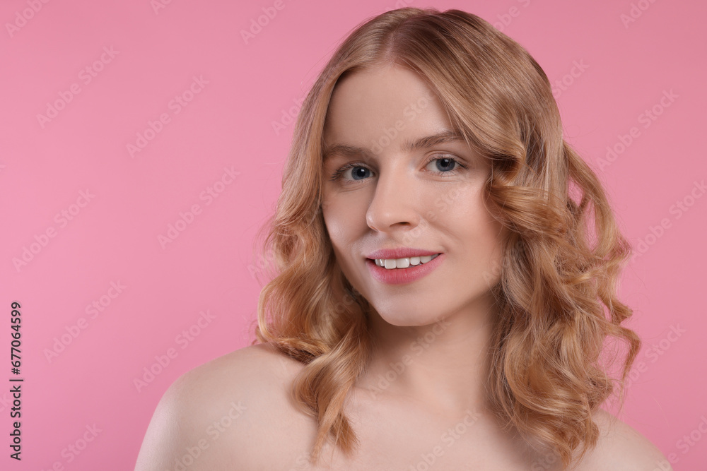 Portrait of beautiful woman with blonde hair on pink background. Space for text Portrait of beautiful woman with blonde hair on pink background. Space for text