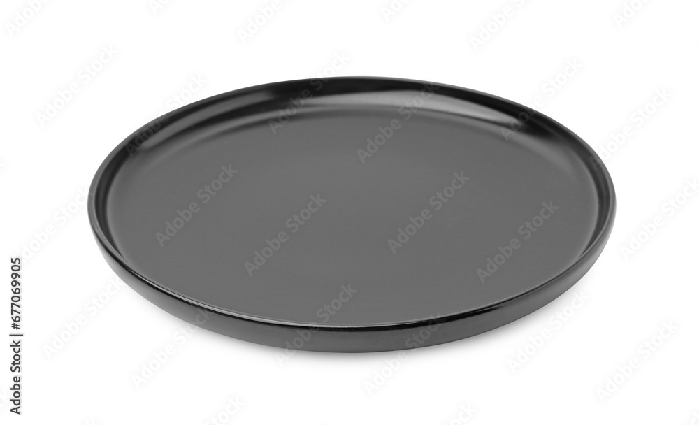 One black ceramic plate isolated on white. Cooking utensil One black ceramic plate isolated on white. Cooking utensil