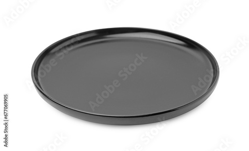 One black ceramic plate isolated on white. Cooking utensil