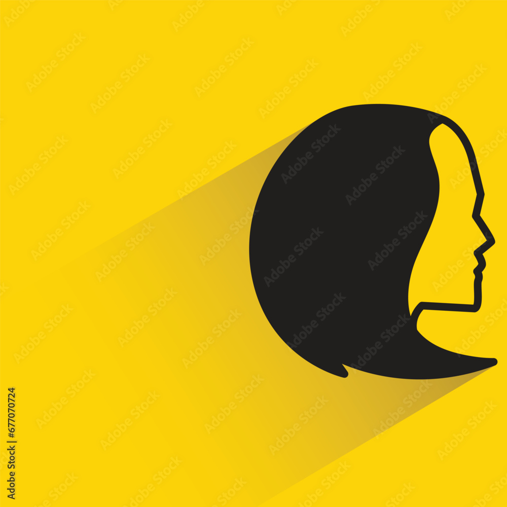 woman hair style with shadow on yellow background woman hair style with shadow on yellow background