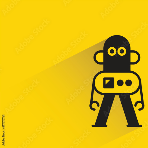 cute robot with shadow on yellow background