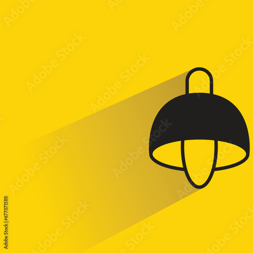 ceiling lamp with shadow on yellow background