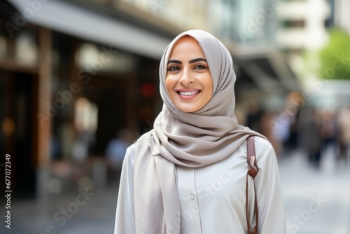 an arab woman smile at camera