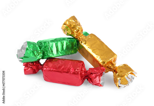 Tasty candies in colorful wrappers isolated on white