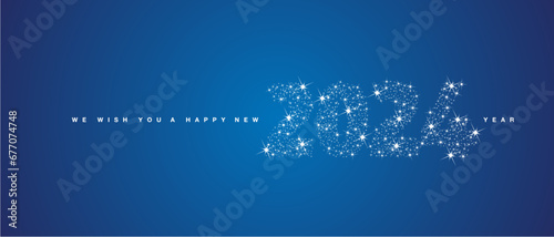 We wish you Happy New Year 2024. Numbers tipography with many stars and stardust in the shape of 2024 on blue background
