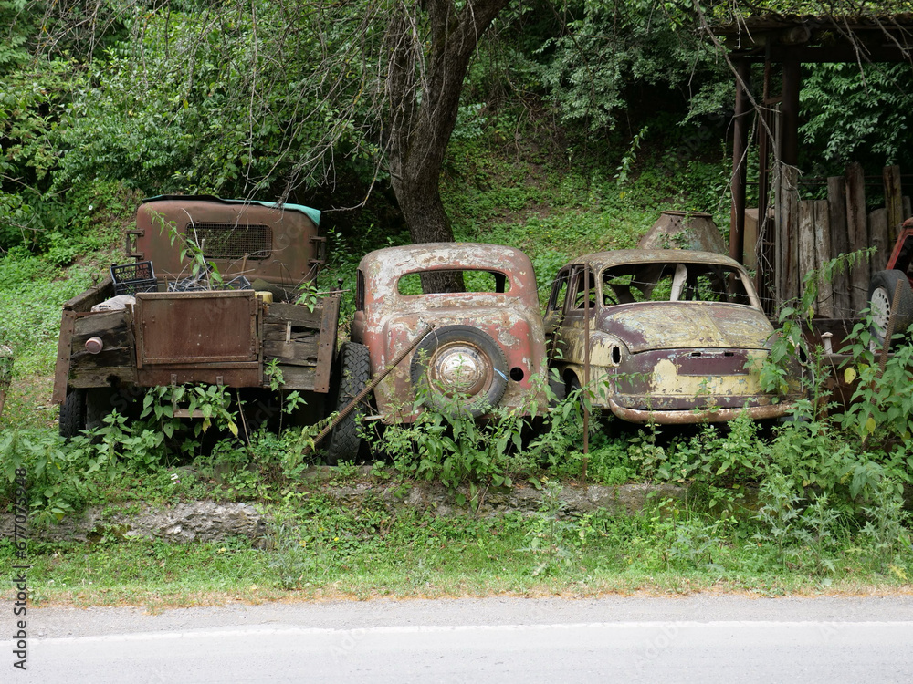Abandoned oldtimers in junkyard Georgia Country 