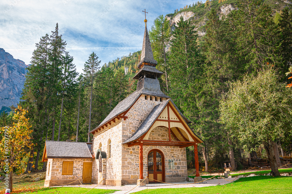 Picturesque little church on the shore of Braies Lake in Italy's Dolomites Picturesque little church on the shore of Braies Lake in Italy's Dolomites