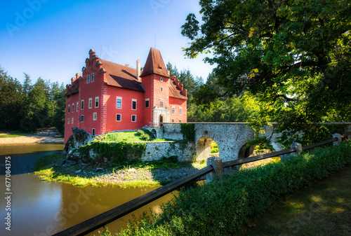 The Small, Charming Cervena Lhota Castle in a Lake in South Bohemia in the Czech Republic photo