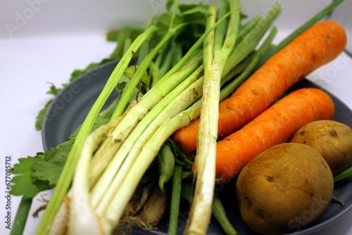 vegetables on a plate, carrots, potatoes, parsley