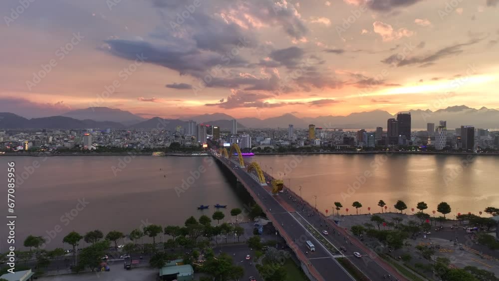 Da Nang, Vietnam Aerial drone video of cars on the iconic Dragon