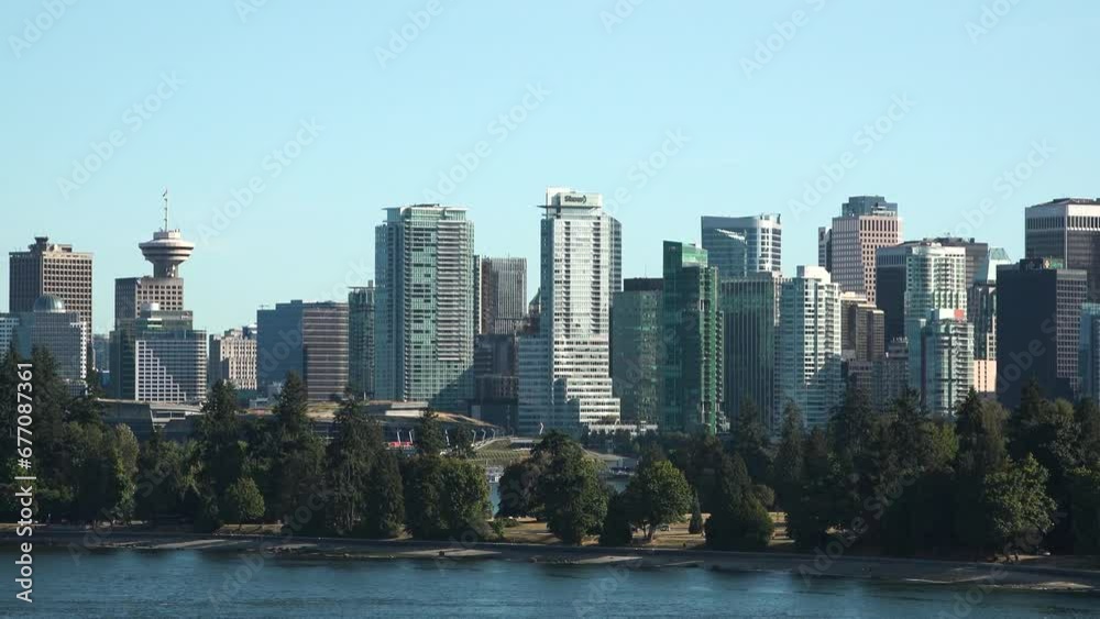 Vancouver, Canada. Panorama of the city. Vancouver City Downtown with skyscraper buildings and mountains in background. Beautiful panorama city view in Canada. Vancouver, Canada. Panorama of the city. Vancouver City Downtown with skyscraper buildings and mountains in background. Beautiful panorama city view in Canada.