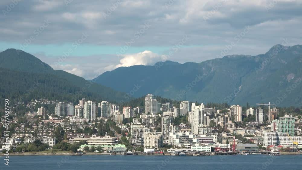 Vancouver, Canada. Panorama of the city. Vancouver City Downtown with skyscraper buildings and mountains in background. Beautiful panorama city view in Canada. Vancouver, Canada. Panorama of the city. Vancouver City Downtown with skyscraper buildings and mountains in background. Beautiful panorama city view in Canada.