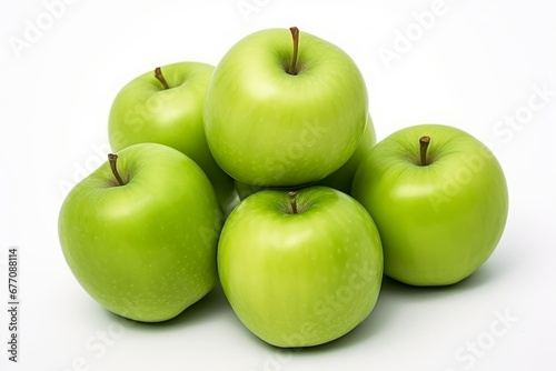 a bunch of green apples on a white background