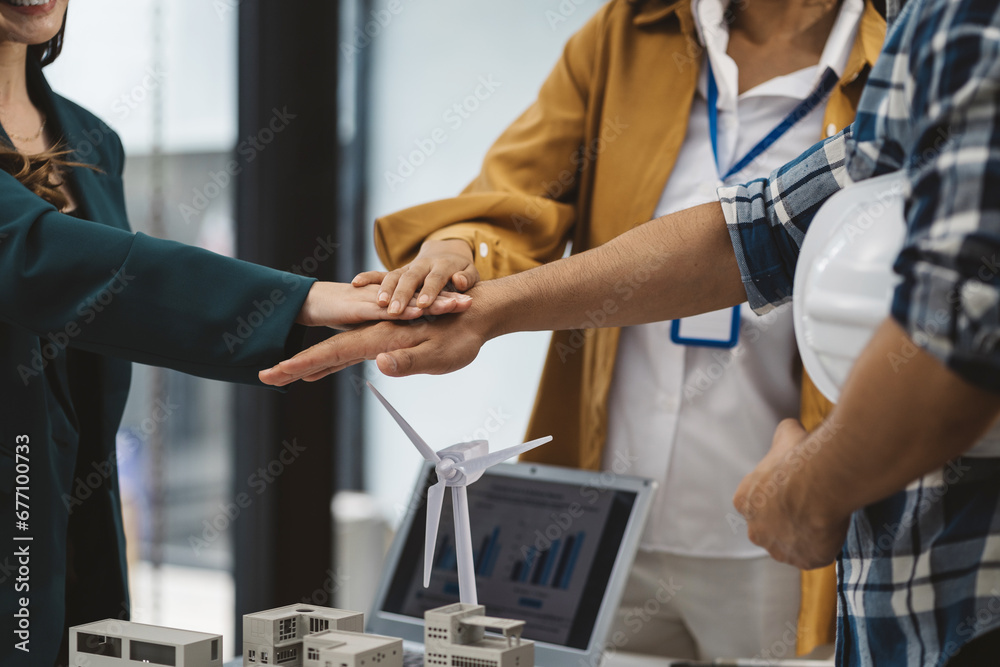 Architect team and Colleagues mixed race, join hands to join forces to join forces to work for the industry for success. Architect team and Colleagues mixed race, join hands to join forces to join forces to work for the industry for success.