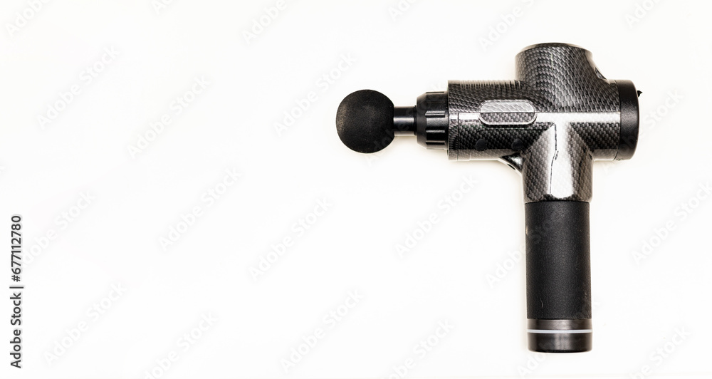 One of massage gun on a white background, professional percussion. Helps relax relief from pain and muscle stiffness.Copyspace for advertising. One of massage gun on a white background, professional percussion. Helps relax relief from pain and muscle stiffness.Copyspace for advertising.