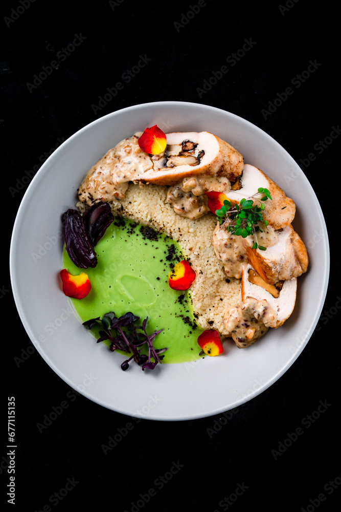 Chicken rolls with mushrooms and onions, sauce, ptitim and microgreens, lunch. Chicken rolls with mushrooms and onions, sauce, ptitim and microgreens, lunch.