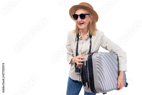 Travel old woman hold baggage Old lady going to travel on holiday Retired woman look at blank space Tourist travel abroad in free time rest getaway Air flight trip journey weekend holiday concept