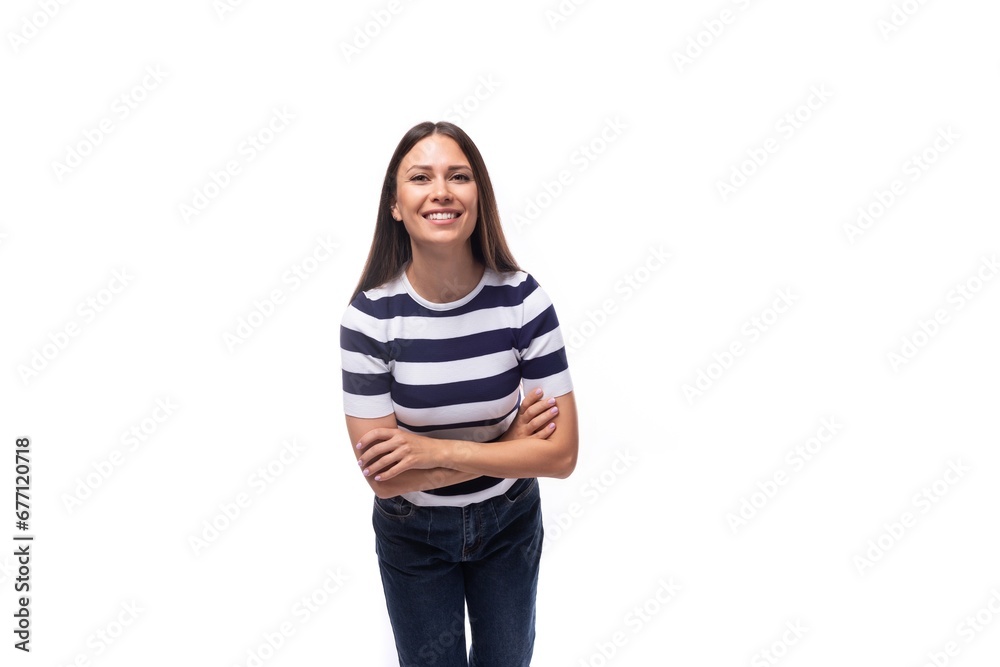 young european lady with black even hair dressed in a striped t-shirt laughs young european lady with black even hair dressed in a striped t-shirt laughs