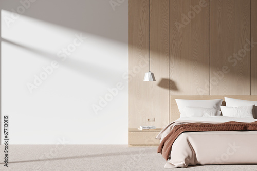 White and wooden bedroom interior with blank wall photo