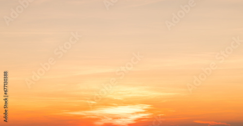 Real amazing panoramic sunrise or sunset sky with gentle colorful clouds. Long panorama, banner with copy space.