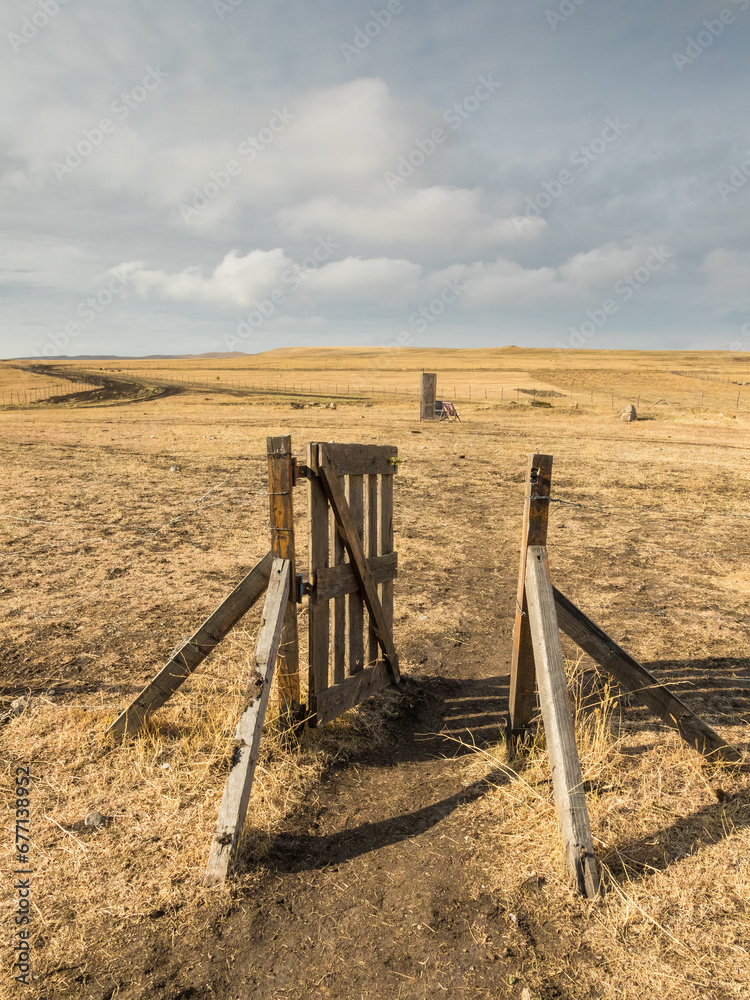 Wooden gate in the Georgian steppe. Udabno, Georgia. Wooden gate in the Georgian steppe. Udabno, Georgia.