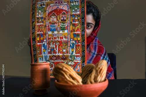 Kolkata, West Bengal, India - June 2, 2022 : Bengali dessert Goja or Khaza on a bowl. It is a popular sweet prepared during festivals like Diwali, Holi, Eid, Ganesh chaturthi against holy background photo