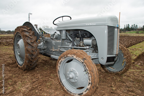 Massey Ferguson Tractor on a ploughed field photo