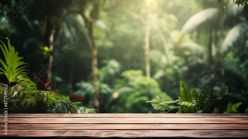 The empty wooden table top with blur background of forest . Exuberant image with empty rustic wooden table for mockup product display. soft focus background. copy space.