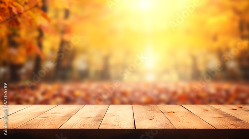 The empty wooden table top with blur background of autumn. Exuberant image. autumn landscape. Concept Autumn nature and product advertising. copy space..