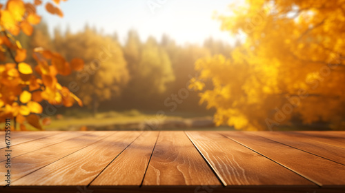 The empty rustic wooden table for product display with blur background of autumn forest. Exuberant image. . background of autumn landscape. Concept Autumn nature and product advertising. copy space..