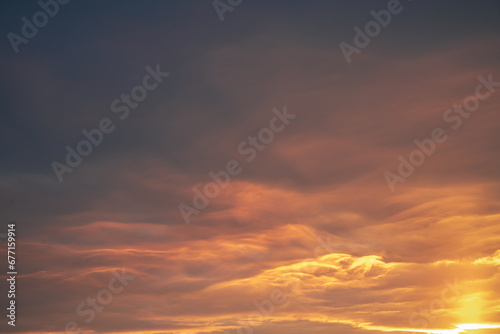 beautiful orange dramatic clouds at sunset © iloli