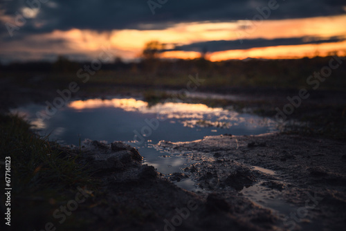 Mud and puddle at sunset