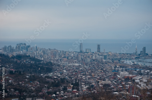 view at city from bird sight, houses, buildings, trees and skyline © goami