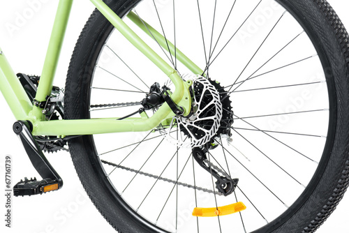 bicycle rear wheel with gears and chain isolated on white background