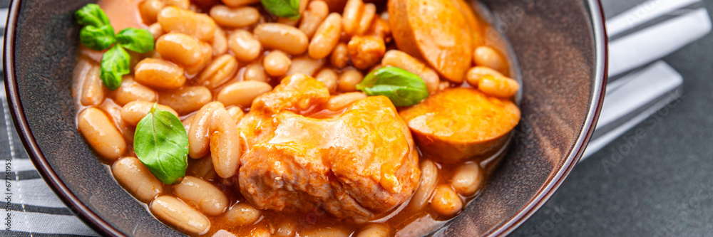 cassoulet thick bean soup meat, beans, sausages eating cooking appetizer meal food snack on the table copy space cassoulet thick bean soup meat, beans, sausages eating cooking appetizer meal food snack on the table copy space