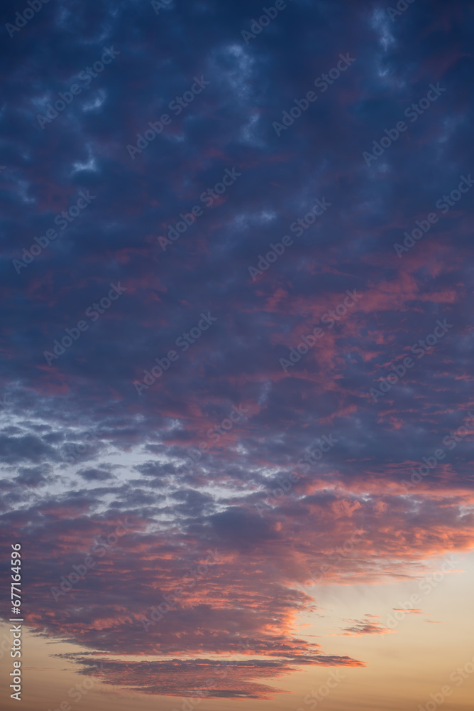 beautiful sunset golden sky, in style of purple, blue and pink clouds background
