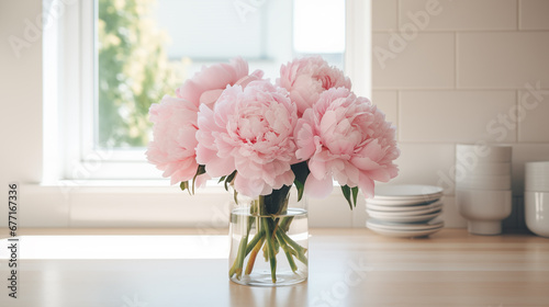 Fototapeta Naklejka Na Ścianę i Meble -  Bouquet of pink peonies in a beautiful vase on table. Springtime blossom, peony bunch. Beautiful spring fresh flowers. Bright room flooded with sun. Floral romantic. Women’s holiday. Generated AI